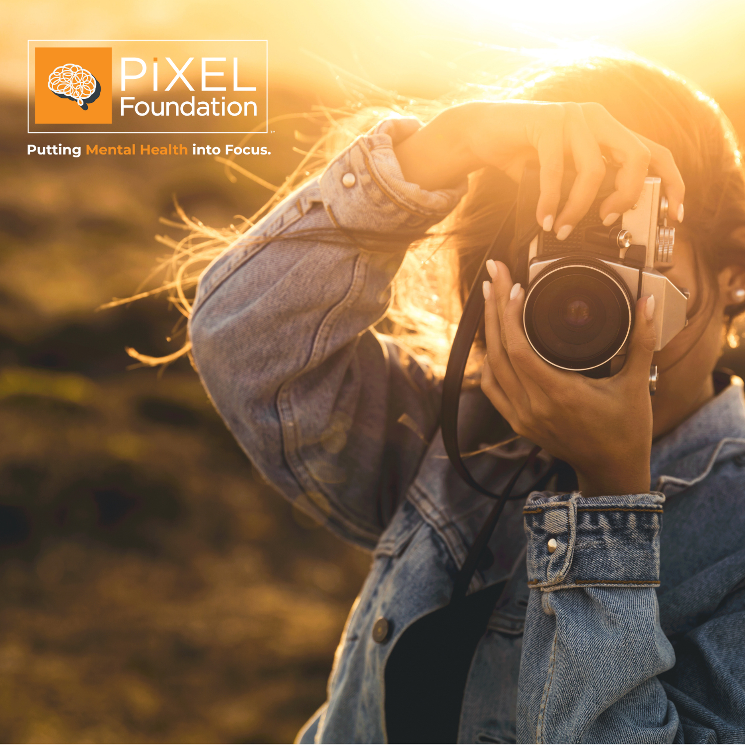 Pixel Foundation - Person with Camera. Putting Mental Health into Focus